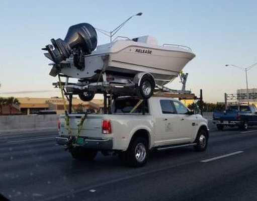 images/gallery/sightgags/BoatOnTrailerOnPickup.jpg